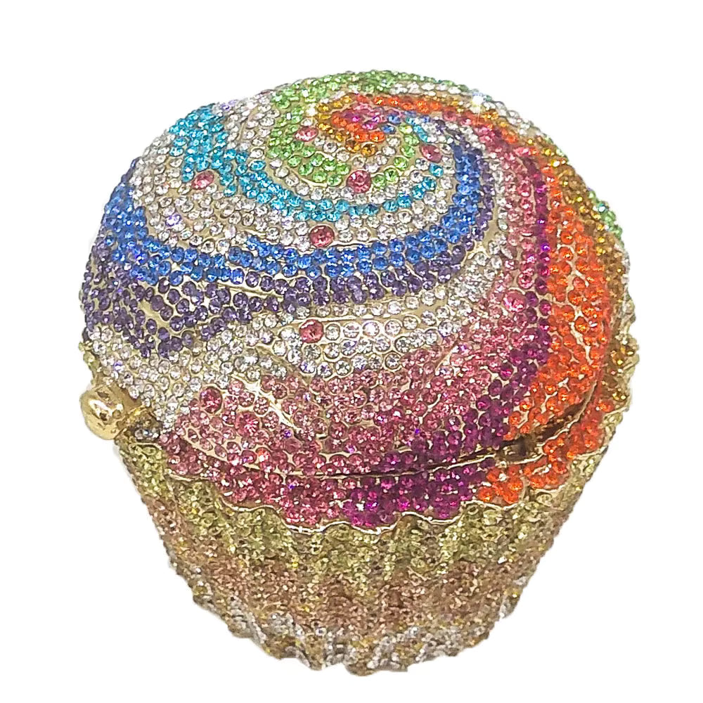 Multicolor cupcake rhinestone purse with blue, pink, purple, green and orange crystal embellishments. Shop a dazzling multicolor cupcake rhinestone purse decorated with blue, pink, purple, green and orange sparkling crystals. multicolor cupcake purse, colorful rhinestone clutch, blue pink rhinestone purse, orange crystal clutch, novelty cupcake bag