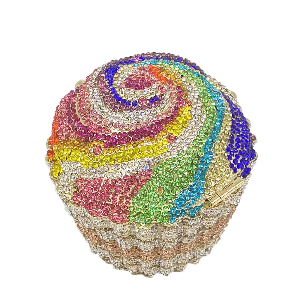 Rainbow multicolor cupcake rhinestone purse covered in sparkling pink, blue, green, yellow and purple crystals. Multicolor rainbow cupcake rhinestone purse featuring sparkling pink, blue, green, yellow and purple crystal embellishments. rainbow cupcake purse, multicolor rhinestone purse, rainbow rhinestone clutch, colorful cupcake handbag, crystal cupcake purse