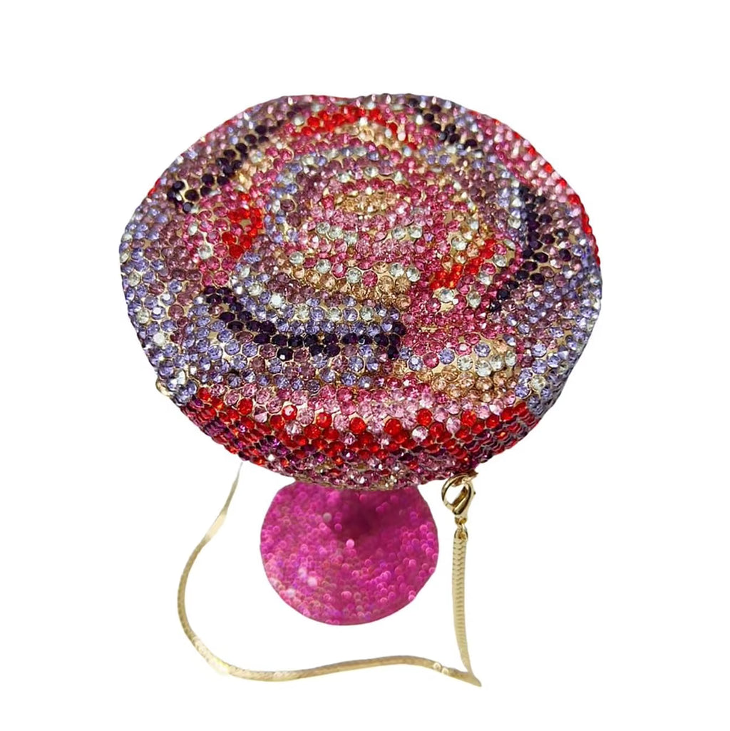 Pink flower goblet rhinestone purse covered in sparkling pink crystal embellishments with elegant gold-tone details and chain strap